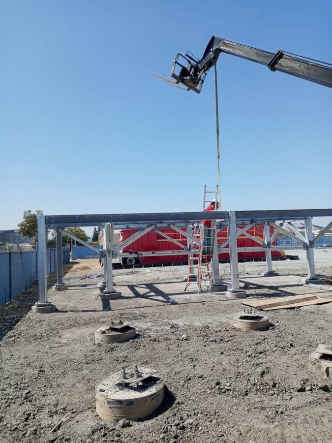 Beams welded together to form a structure for a building